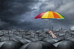 a close up of an umbrella on a cloudy day